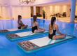 3 Women doing float yoga